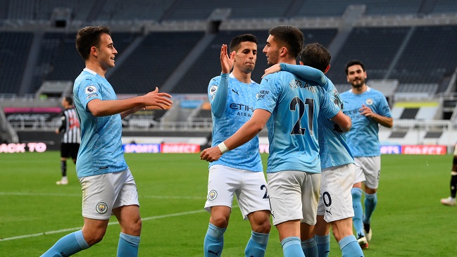 Manchester City festejó su título en la liga inglesa con “guerra de goles” ante Newcastle