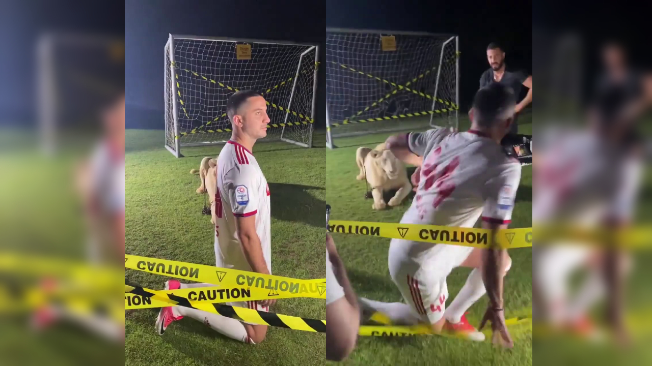 Jugador griego pasó tremendo susto al posar junto a un león en sesión oficial de su nuevo club