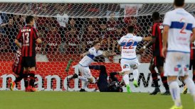 La UC reaccionó a tiempo para igualar con Atlético Paranaense en Copa Libertadores