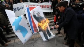 Queman foto de Kim Jong-Un en protesta por participación en JJ.OO.