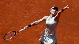 Halep mantendrá el número uno del mundo tras derrota de Wozniacki en Madrid