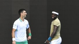 Djokovic resistió el ímpetu de Tiafoe y avanzó a tercera ronda en Australia
