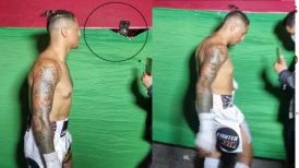 Boxeador peruano se enfadó y pateó en el suelo el celular de una fanática