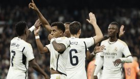 Real Madrid goleó a Valencia y sigue al acecho del líder Girona en La Liga