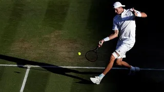 John Isner alcanzó sus primeras semifinales de Grand Slam a costa de Milos Raonic