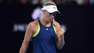 Caroline Wozniacki ganó su primer Grand Slam en Australia y le quitó el número uno a Halep