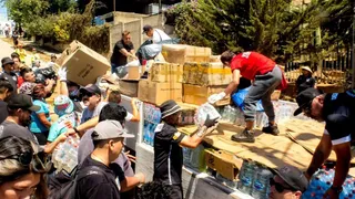 Socios del CSyD Colo Colo llevaron ayuda a damnificados por los incendios